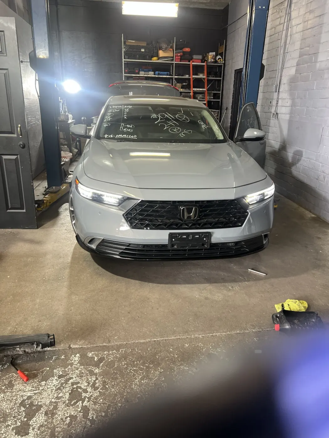 Completed Honda front-end repair inside the shop